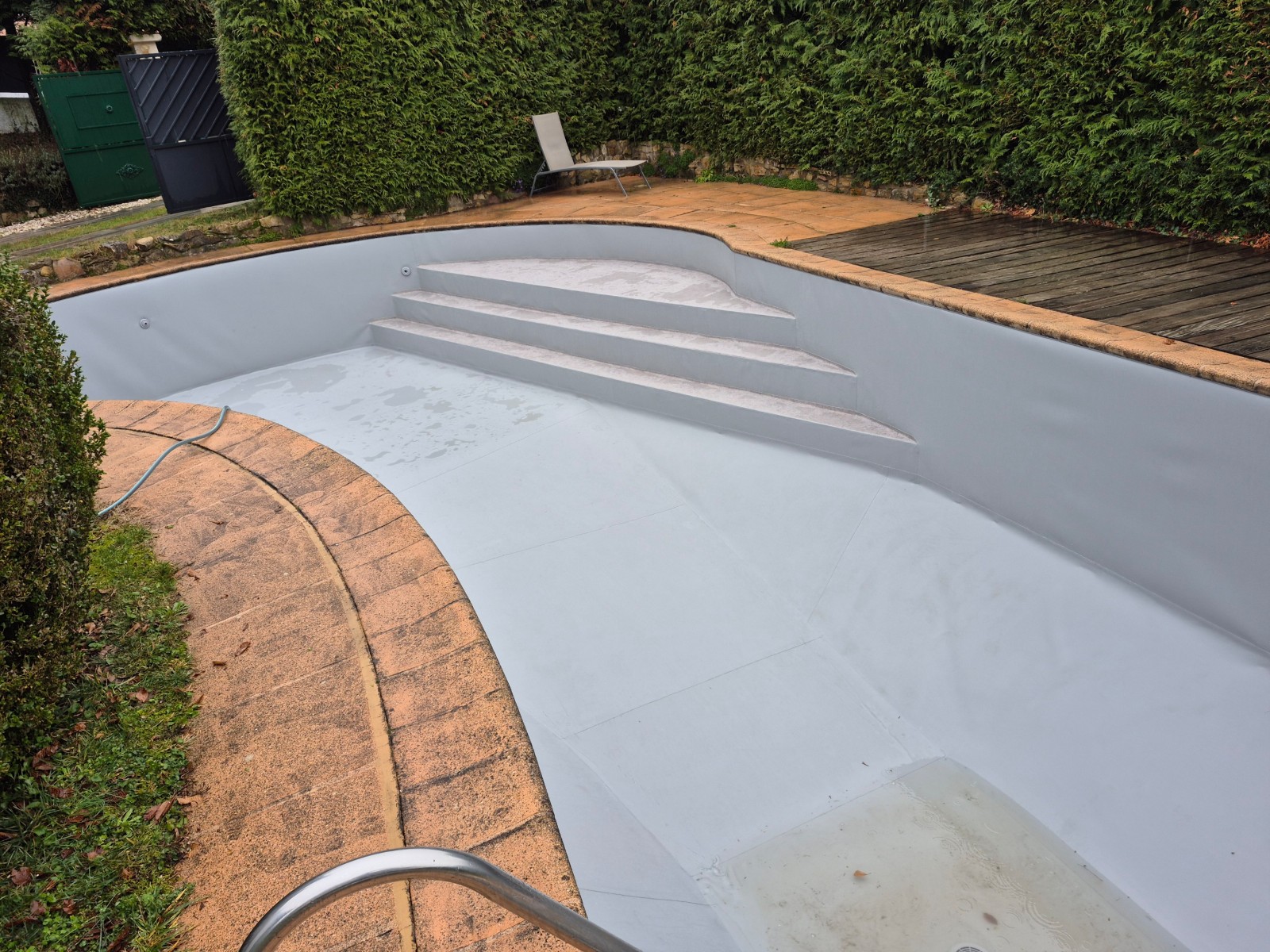 Changement de revetement sur piscine en forme carrelées 