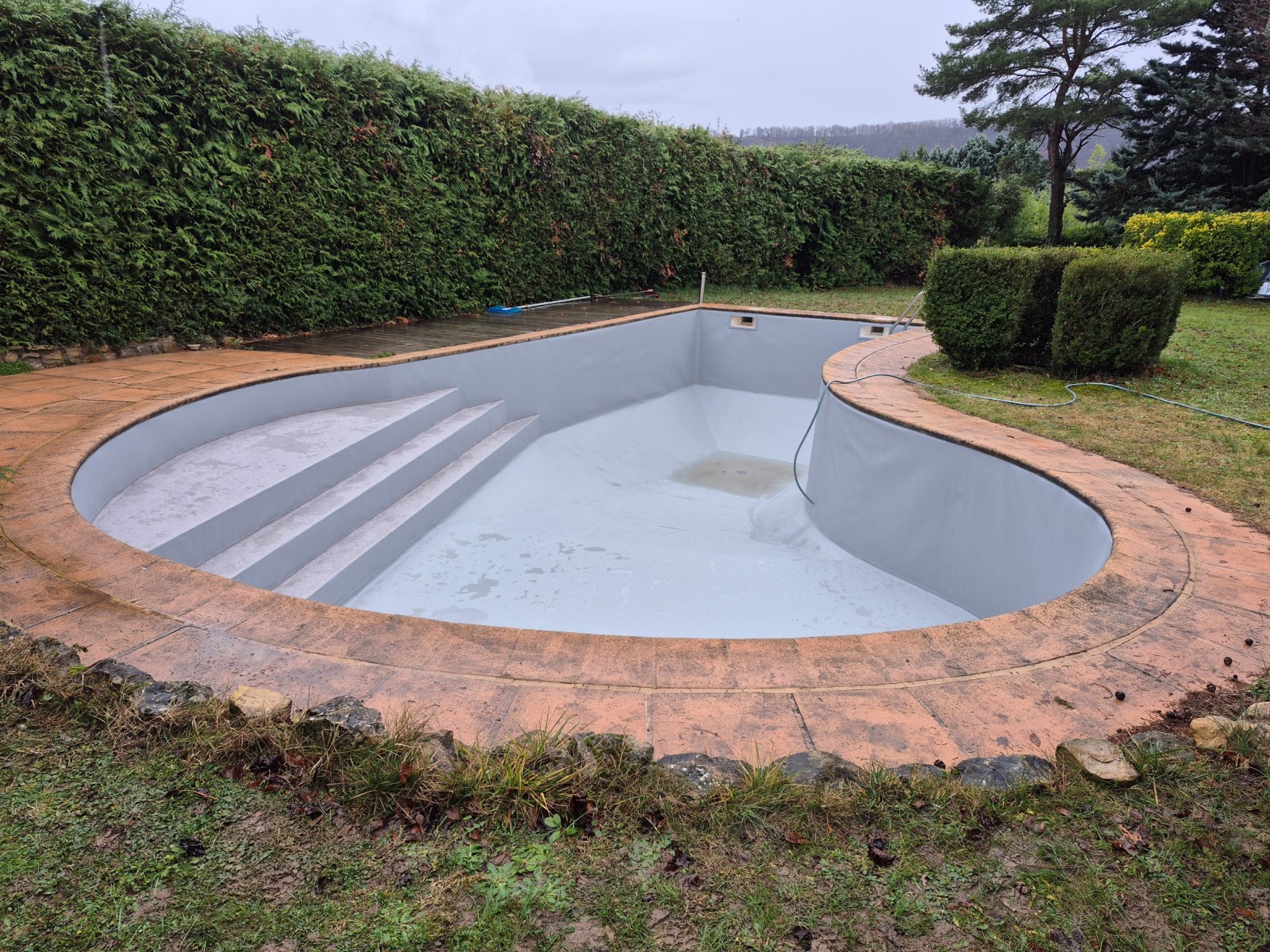 Changement de revetement sur piscine en forme carrelées 