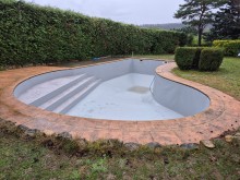 Changement de revetement sur piscine en forme carrelées 